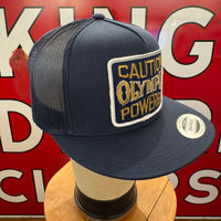 CAUTION OLYMPIA POWERED Vintage Patch + Yupoong 6006 Snapback