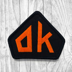 “OK” Orange/Black. New Patch